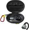 A pair of black Hama True Wireless Stereo (TWS) earbuds are shown inside their open black charging case. A red carabiner clip with yellow loops is attached to the case. Anteprima dell’immagine prodotto