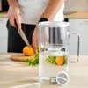 A person is preparing fruit-infused water in a kitchen setting. Anteprima dell’immagine prodotto