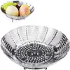 A stainless steel steamer basket filled with fruit, shown from a close-up angle. Produktbild-Vorschau