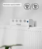 A white device is placed on top of a white radiator. Produktbild-Vorschau