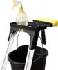 A cleaning accessory tray with a spray bottle and a sponge, placed on a ladder, with a bucket hanging below. Podgląd zdjęcia produktu