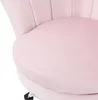 A close-up view of a pink velvet office chair. Náhled obrázku produktu