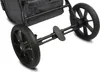 Close-up view of the rear wheels and brake mechanism of a stroller. Náhľad obrázku produktu