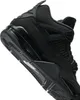 A close-up, angled view of a black Nike Air Jordan 4 Retro sneaker. Náhľad obrázku produktu
