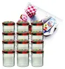 A set of glass jars with decorative lids, a recipe booklet, and a packet of gelling sugar. Produktbild-Vorschau