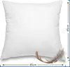 A white pillow with a feather on it, with dimensions indicated. Produktbild-Vorschau