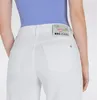 Close-up of the back of white jeans worn by a person. Produktbild-Vorschau