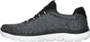 A side view of a black and white Skechers sneaker. Produktbild-Vorschau