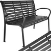 A black metal garden bench with a slatted seat and backrest, shown from a slightly elevated side angle against a white background. A portion of another bench is visible in the foreground, angled diagonally. Náhled obrázku produktu