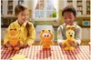 Two children are playing with plush toys in a kitchen setting. Podgląd zdjęcia produktu