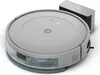 A robot vacuum cleaner and its charging dock are shown against a white background. Voir les images du produit