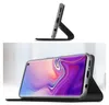 A smartphone in a flip case, shown from two angles. Anteprima dell’immagine prodotto