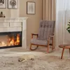 A cozy living room scene with a fireplace, a rocking chair, and a sleeping puppy on a rug. Podgląd zdjęcia produktu