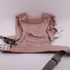 A pink baby carrier laid out flat on a white background. Produktbild-Vorschau