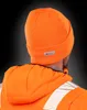 A person wearing an orange beanie and jacket. Anteprima dell’immagine prodotto