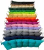 A stack of colorful cushions arranged in a gradient. Produktbild-Vorschau