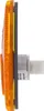 Side view of an orange oval side marker light with a gray gasket and a white connector. Podgląd zdjęcia produktu