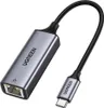 A Ugreen USB-C to Ethernet adapter is shown against a white background. Voir les images du produit