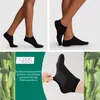 A collage showing black ankle socks on legs, close-ups of the socks, and bamboo stalks. Text highlights the material properties. Produktbild-Vorschau