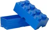 A blue LEGO storage box, shaped like a large LEGO brick, is shown with its lid slightly ajar, revealing the interior. Voir les images du produit