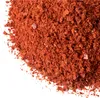A close-up view of gochugaru (Korean chili flakes). Produktbild-Vorschau