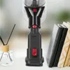 Close-up of a vacuum cleaner attachment with a diffuser and books in the background. Produktbild-Vorschau