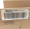 A close-up of a cardboard box with a label and barcode. Produktbild-Vorschau