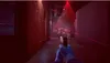 A first-person perspective of someone holding a gun in a room with red laser grids. Podgląd zdjęcia produktu