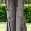 A close-up view of the fabric of a gazebo or tent, showing ties or straps. Produktbild-Vorschau