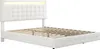 A white upholstered bed frame with a tufted headboard and integrated LED lighting. Produktbild-Vorschau