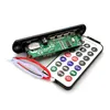 A close-up shot of a car audio board with a remote control, set against a white background. Podgląd zdjęcia produktu