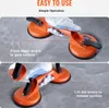 Two images showing how to use a suction cup lifter. The top image shows how to press down the levers to gain suction, and the bottom image shows how to lift the levers to release suction. A hand wearing a glove is operating the suction cup lifter. Anteprima dell’immagine prodotto