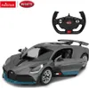 A remote-controlled Bugatti Divo car and its steering wheel remote control are displayed against a white background. Produktbild-Vorschau