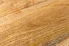 A close-up, angled view of a wooden surface, likely a shelf or table, showing the grain and texture of the wood. Produktbild-Vorschau