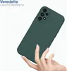 A hand holding a dark green phone case against a white background. Produktbild-Vorschau
