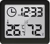 A digital thermometer and hygrometer displaying time, temperature, and humidity. Anteprima dell’immagine prodotto