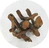 A top-down view of a coffee table with a glass top and a base made of intertwined driftwood. Produktbild-Vorschau