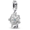 A silver charm in the shape of a snow globe with snowflakes inside, hanging from a bail with snowflake engravings. Podgląd zdjęcia produktu