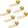 A set of six candle holders for Christmas pyramids, arranged diagonally on a white background. Produktbild-Vorschau