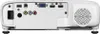 The back view of a white projector with various ports and a speaker grill. Voir les images du produit