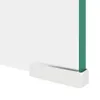 A close-up view of the bottom corner of a transparent glass TV stand or screen riser with a white base. Voir les images du produit