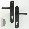 A pair of black door handles with keyhole plates and mounting hardware are displayed against a white background. Podgląd zdjęcia produktu