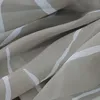 A close-up view of a fabric with a striped pattern. Produktbild-Vorschau