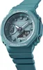 A close-up, angled studio shot of a teal Casio G-Shock watch against a white background. Produktbild-Vorschau