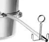A close-up of a metal juicer attachment with a clear tube, connected to a metal pot, against a white background. Produktbild-Vorschau