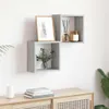 Two gray cube shelves mounted on a white wall above a wooden cabinet. Anteprima dell’immagine prodotto