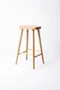 A wooden bar stool is shown against a white background. Produktbild-Vorschau
