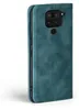 A teal-colored flip case for a smartphone is shown against a white background. Produktbild-Vorschau
