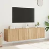 A modern living room setup with a wall-mounted TV and a wooden TV stand. Náhľad obrázku produktu