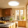 A modern kitchen with wooden cabinets, a marble island, and a large window. Anteprima dell’immagine prodotto
